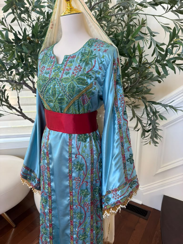 Elegant Sky Blue Satin Thobe with Intricate Green and Pink Floral Embroidery, Burgundy Belt(scarf not included)