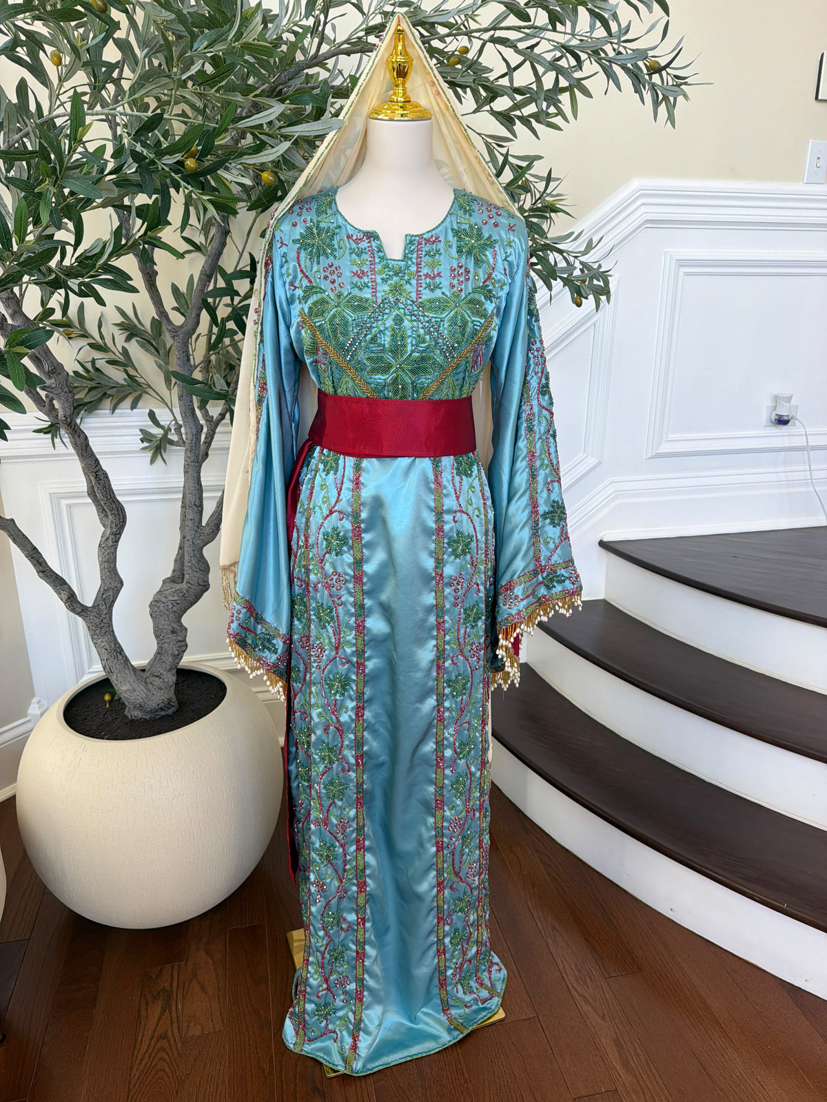 Elegant Sky Blue Satin Thobe with Intricate Green and Pink Floral Embroidery, Burgundy Belt(scarf not included)