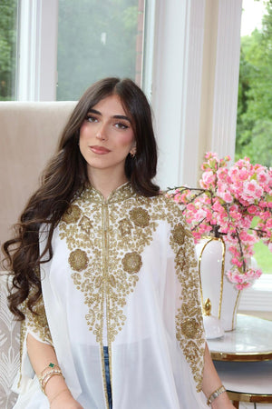 ‎⁣⁣⁣⁣⁣⁣⁣⁣⁣⁣⁣⁣⁣⁣⁣⁣ Royal White Abaya with Intricate Gold Detailing