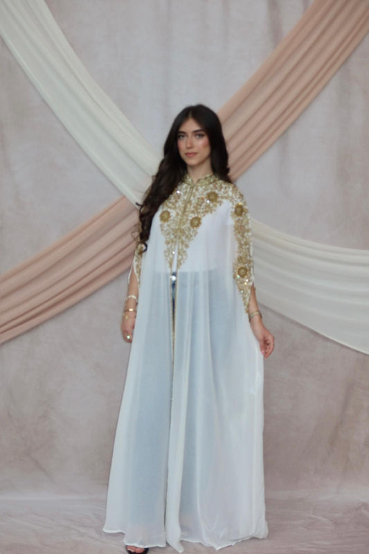 ‎⁣⁣⁣⁣⁣⁣⁣⁣⁣⁣⁣⁣⁣⁣⁣⁣ Royal White Abaya with Intricate Gold Detailing