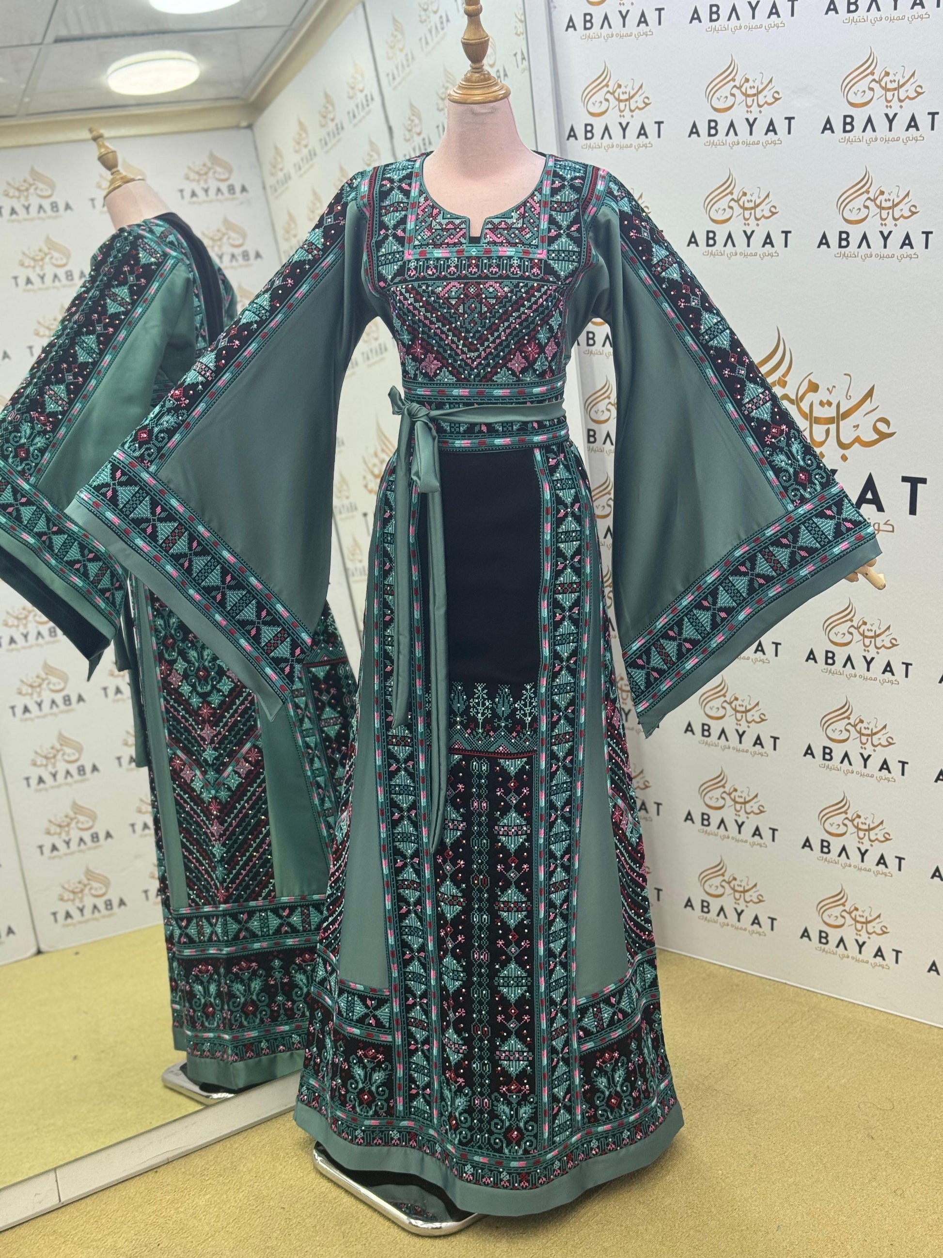 Luxury Palestinian Embroidered Thobe – Deep Green Traditional Design