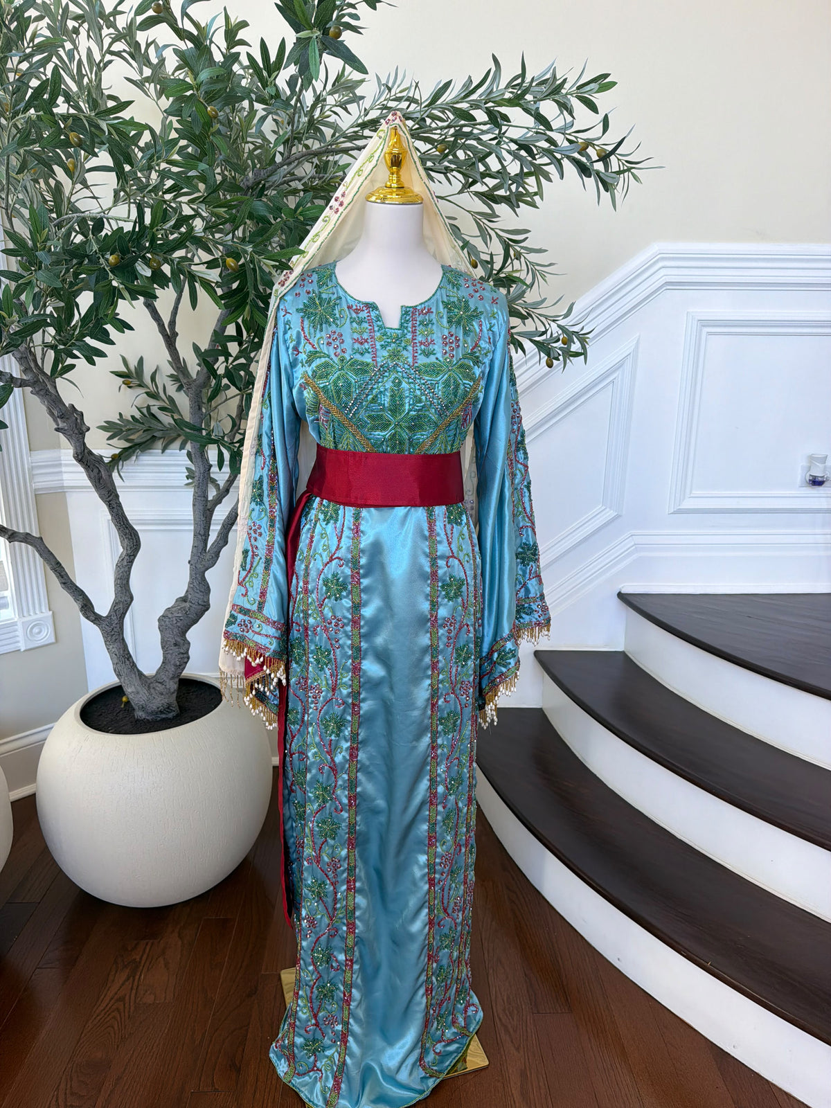 Elegant Sky Blue Satin Thobe with Intricate Green and Pink Floral Embroidery, Burgundy Belt(scarf not included)