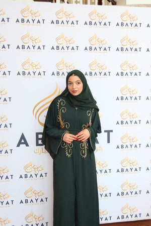 Emerald Elegance: Charming Gold Abaya