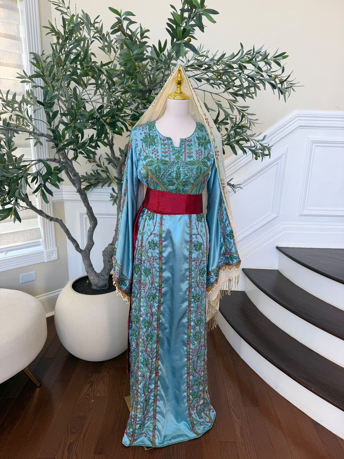 Elegant Sky Blue Satin Thobe with Intricate Green and Pink Floral Embroidery, Burgundy Belt(scarf not included)