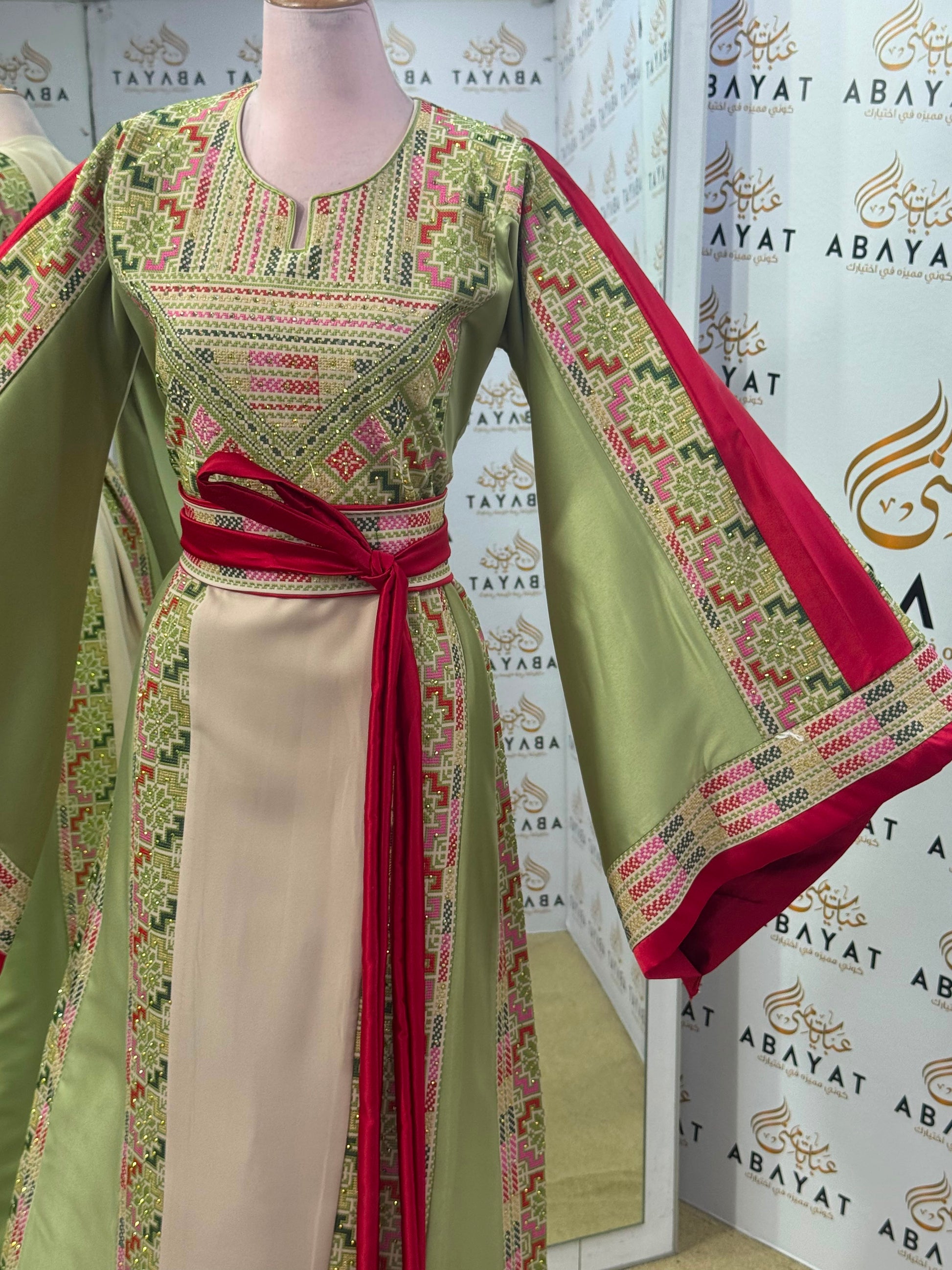 Ivory & Sage Green Palestinian Tatreez Thobe with Raspberry Accents