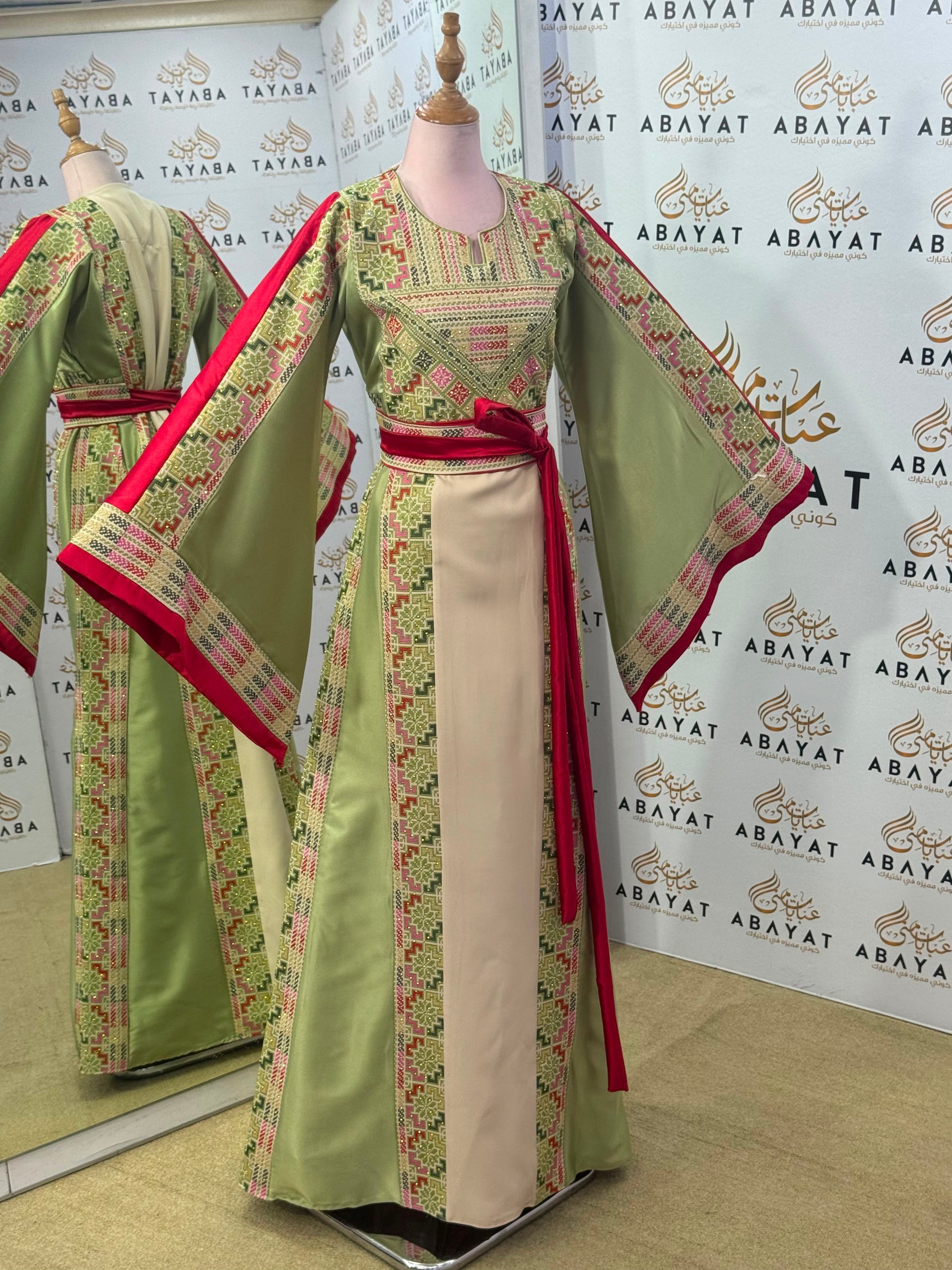 Ivory & Sage Green Palestinian Tatreez Thobe with Raspberry Accents