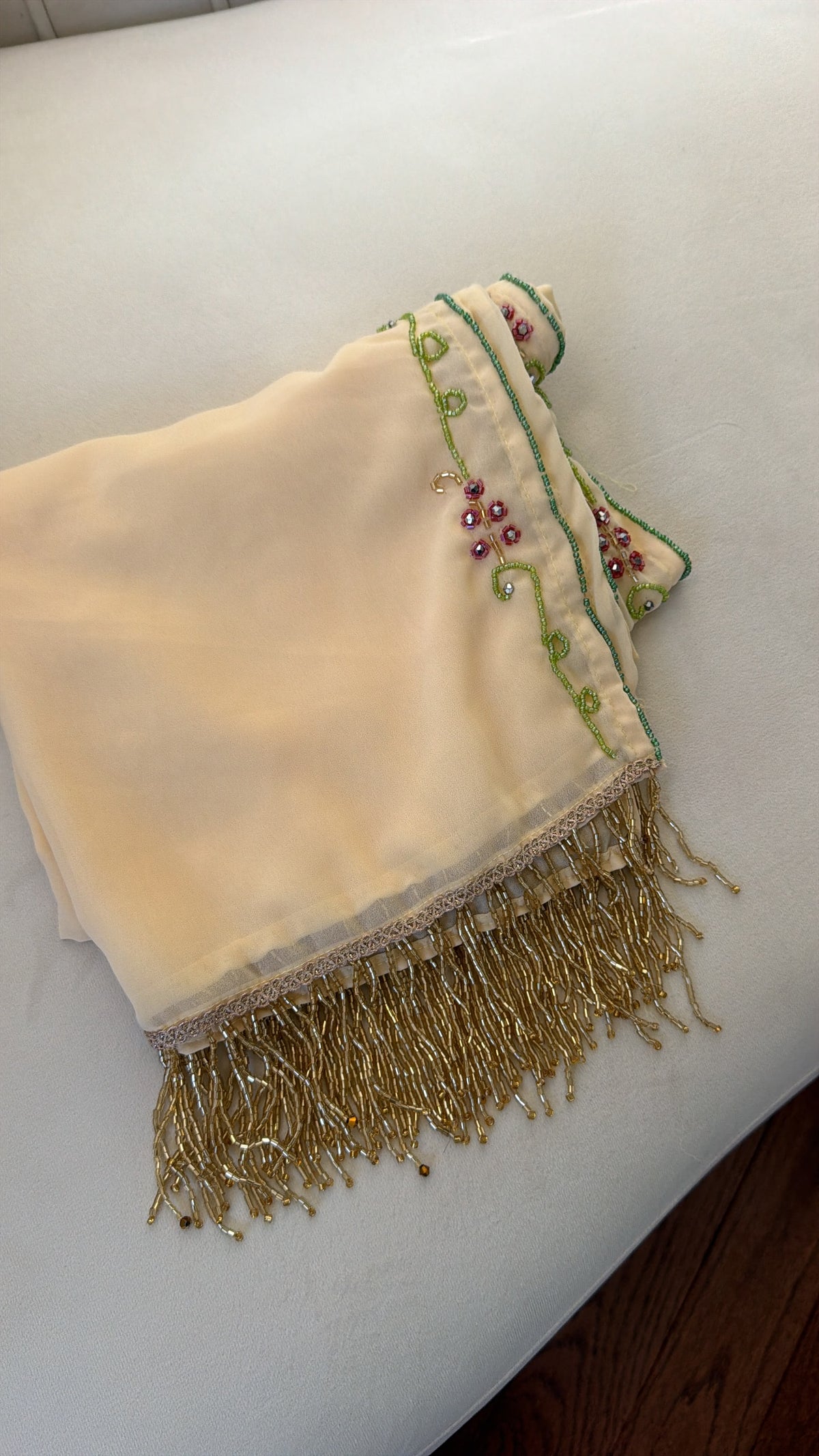 Elegant Cream Scarf with Green Vine Embroidery, Pink Beaded Floral Accents, and Gold Beaded Fringe