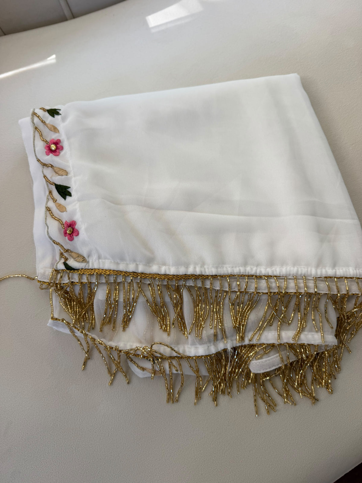 Elegant White Scarf with Pink Floral Embroidery and Gold Beaded Fringe